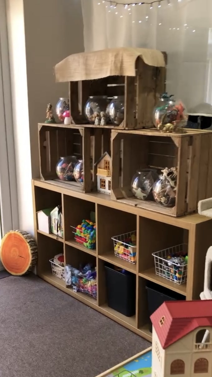Shelf baskets containing toys