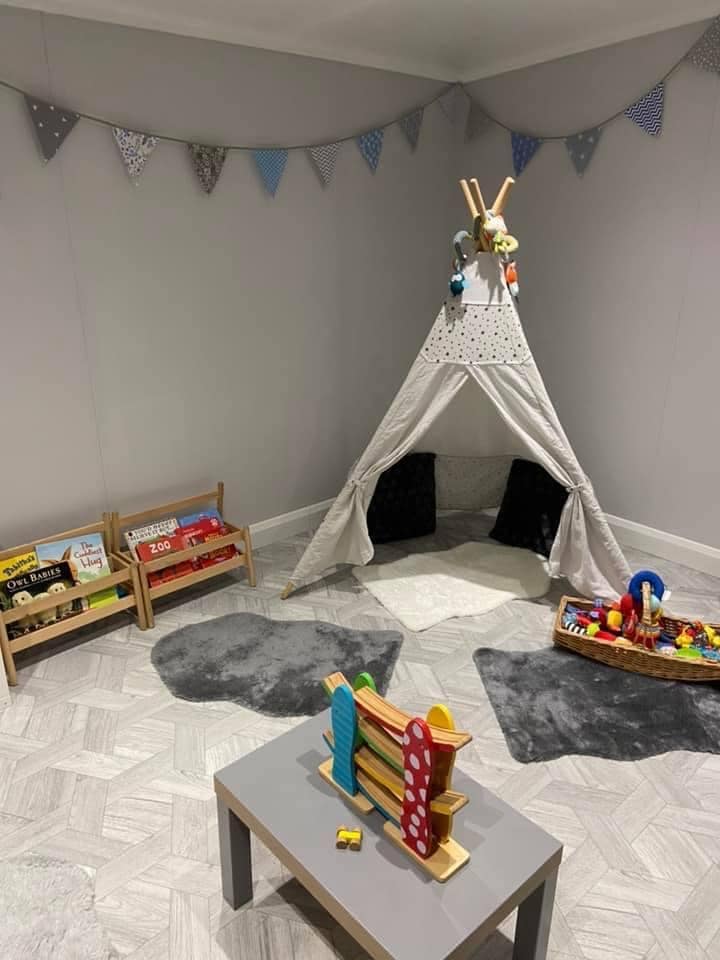 Play area with a tipi tent